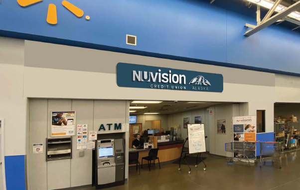 Photo of the East Anchorage Walmart's branch exterior in Anchorage, AK with a dark blue and silver logo reading Nuvision Credit Union Alaska complete with a mountain decal